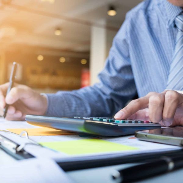 business-finance-man-calculating-budget-numbers-invoices-and-financial-adviser-working.jpg